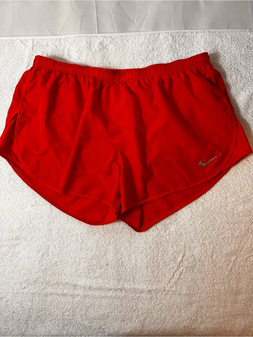 Nike Women’s Bright orange  Athletic Running shorts Size medium